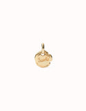Charm with the word “suerte” (gold)