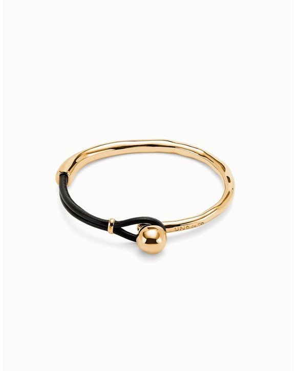 Gold bracelet with brown leather