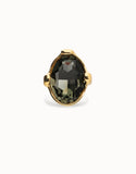Large ring with oval faceted gray crystal