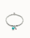 Beaded stretch bracelet with a murano glass and a hamsa