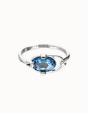 Bangle bracelet with faceted blue crystal, silver