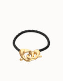 Black leather bracelet with interlocking carabiner