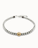 Beaded short necklace with larger central bead, silver w/gold bead