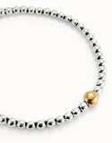 Beaded short necklace with larger central bead, silver w/gold bead