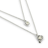 Long pendant and central charm with transparent crystal (gold or silver)