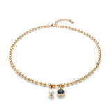 Beaded necklace with dangling blue crystal and pearl (silver or gold)