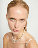Short beaded necklace with medium and a large sphere, silver