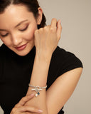 Two EXPEARLTIONAL Bracelet