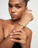 Cuff bracelet with two multicolored crystals, gold