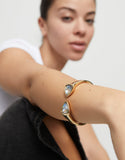Bangle bracelet with two multicolored crystals, gold