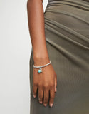 Beaded stretch bracelet with a murano glass and a hamsa