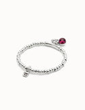 Beaded stretch bracelet with a murano glass and Suerte charm (silver)