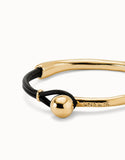 Gold bracelet with brown leather