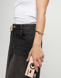 Gold bracelet with brown leather