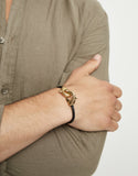 Black leather bracelet with interlocking carabiner