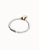 Elastic beaded bracelet with small and large beads, silver/gold